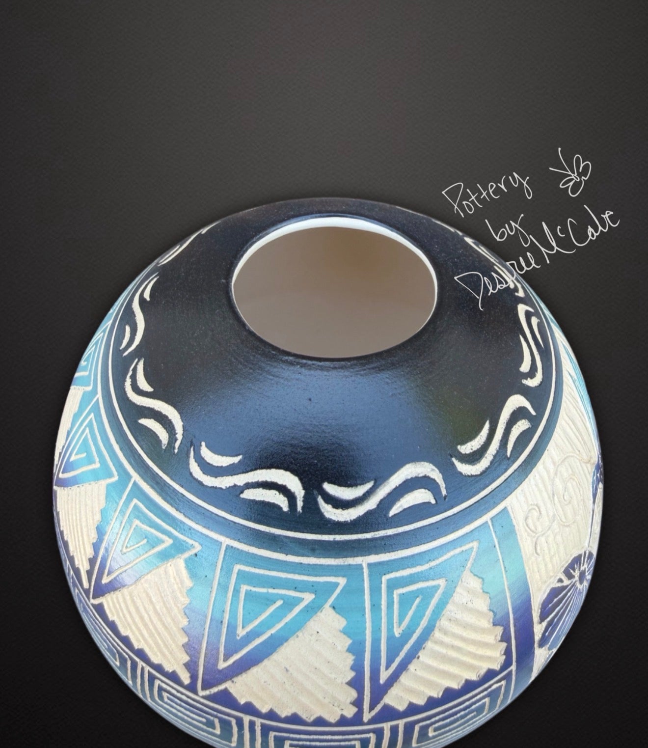 Black Medium Ball Pot Featuring A Humming Bird